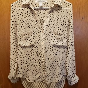 Cutest polka shirt with lace back.